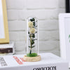 Artificial Flowers in Glass Dome on a Wooden Base for Home Decor White