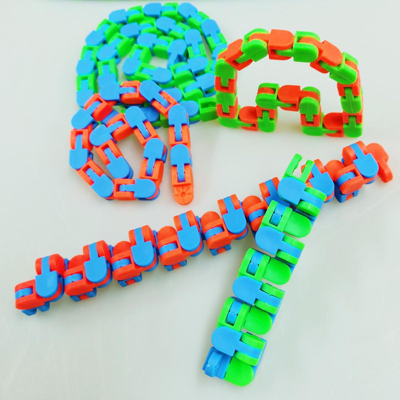 Wacky Tracks Snap and Click Sensory Toys Kids Adult Puzzles Orange Green